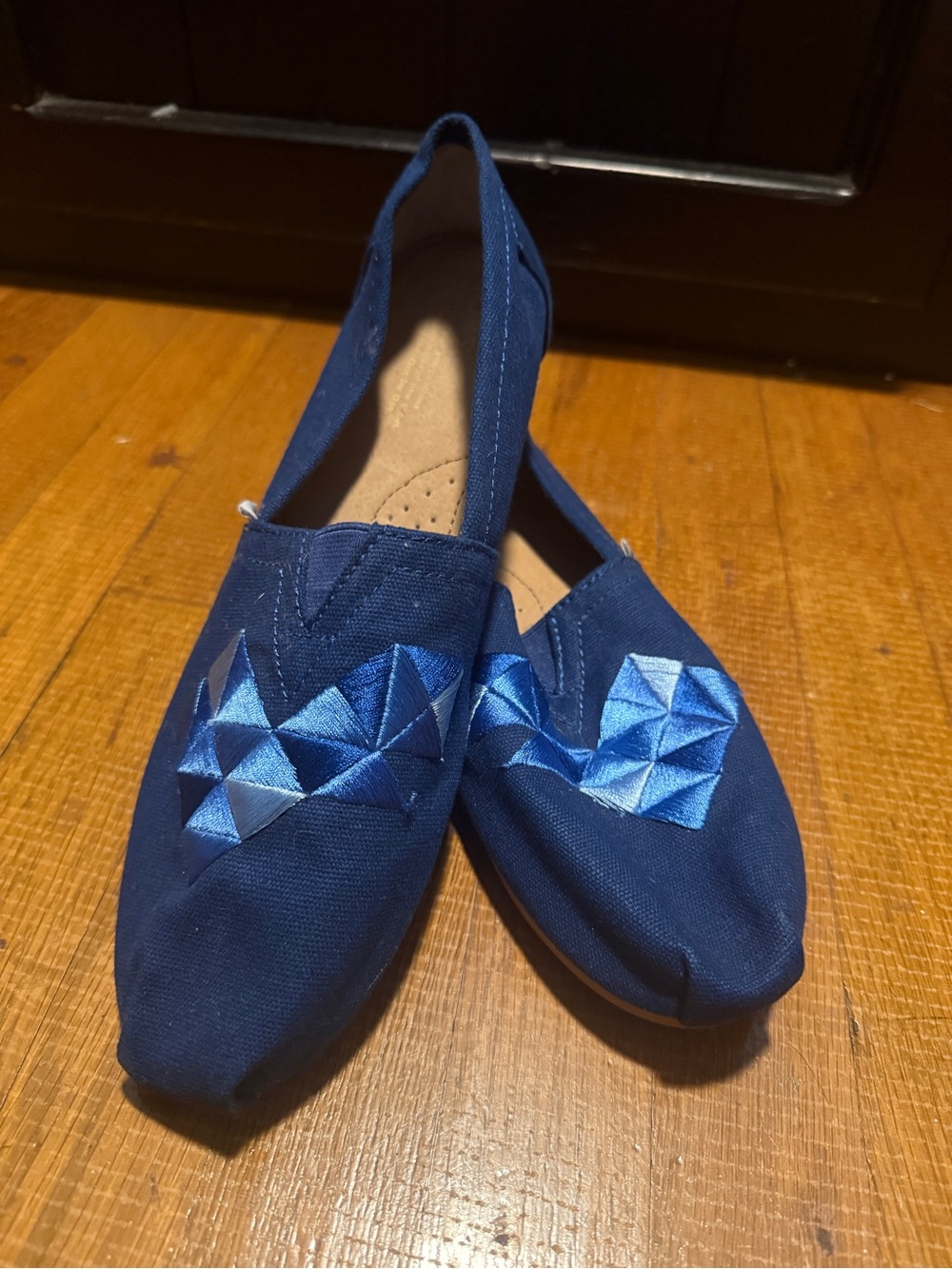 Toms Navy Canvas Slip-On Moccasins with Blue Geometric Heart Embroidery